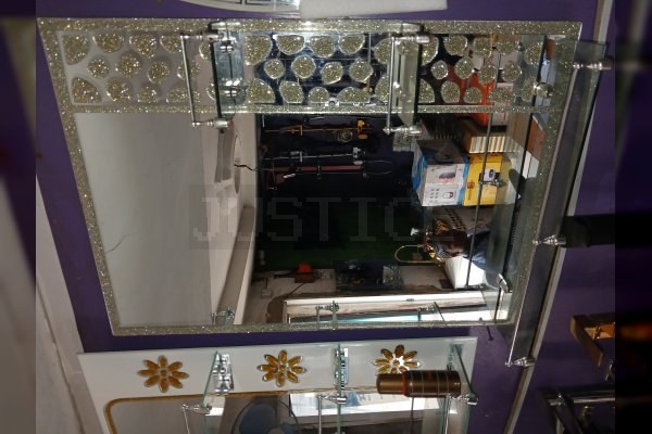 Elegant Triple-Shelf Reflective Mirror